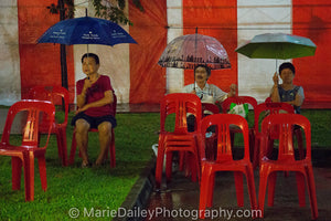 Red Chairs and Umbrellas